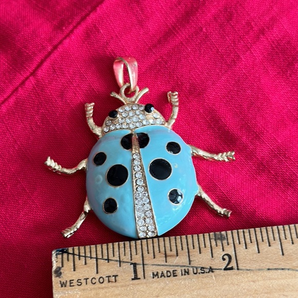 Betsey Johnson Jewelry - Betsy Johnson turquoise with black spots lady bug pendant gold tonecrystal